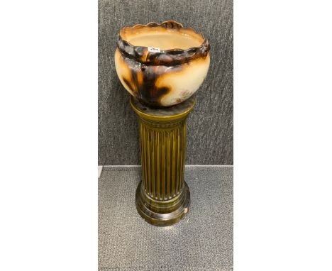 A 19th century ceramic plant holder with similar pedestal stand, overall H. 92cm.
