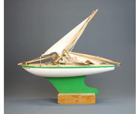 A vintage mounted model of a wooden pond yacht, L. 45cm.