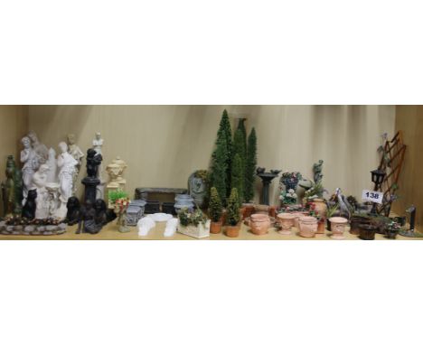 A large quantity of dolls house garden ornaments, statues, animals, etc, including a few architectural items.