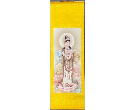 A Chinese silk mounted scroll of the goddess Guanyin, 50 x 145cm.