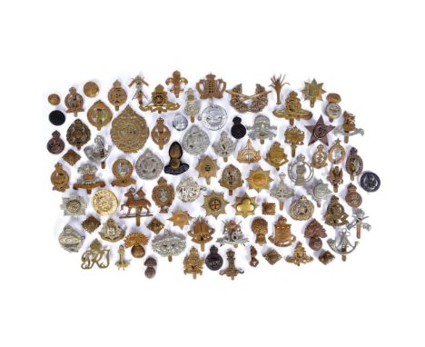 A large collection of assorted British War time and post war military cap badges to include; Duke of Cornwall Light Infantry,
