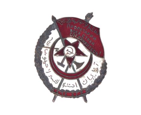 An early 20th Century Soviet Union Order of the Red Banner of Azerbaijan badge. Silver metal with a white enamel ground, red 