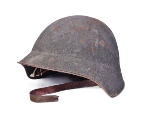 An early 20th Century / WWI First World War Eastern European Military helmet, likely Russian or neighbouring countries. Disti