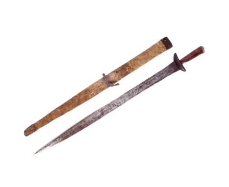 A mid 20th Century Northern Cameroon Guduf People sword. The sword with a wooden hilt and crossguard and a multifullered tape