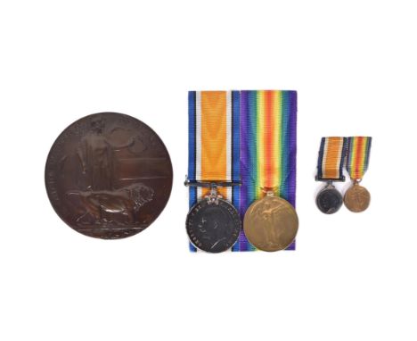 A WWI First World War medal pair to one 124324 Gunner A. Lang of the Royal Artillery. Both mounted, with ribbons and the offi