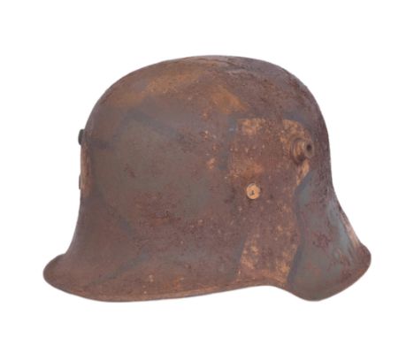 A WWI First World War Imperial German / Prussian Army M17 Stahlhelm helmet. Jigsaw pattern camo with x2 side lugs and x6 tong