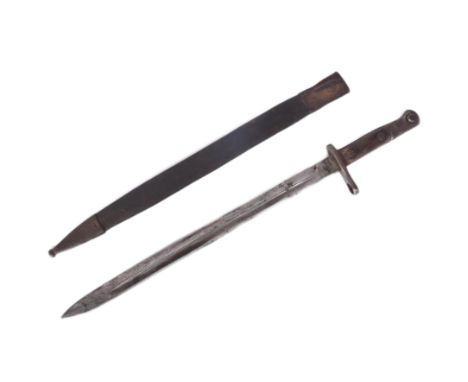 An original WWI First World War era 1907 pattern Lee Enfield rifle bayonet. The bayonet having a hooked steel pommel with wor