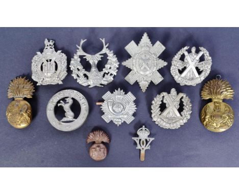 A collection of Scottish interest military uniform cap badges to include; Royal Scots Fusiliers, 5th Battalion Seaforth Highl