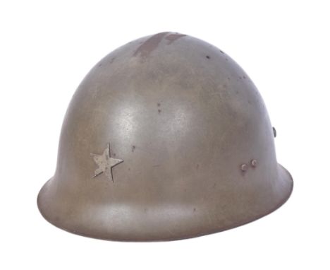 A WWII Second World War Imperial Japanese Army Type 90 steel combat helmet with star insignia badge, leather liner and chin s