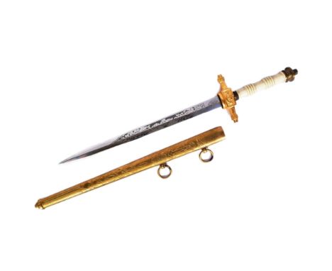 A mid 20th Century Naval Officers / Naval Cadet's Dirk. Brass tiered pommel with a ribbed Bakelite grip, gilt crossguard and 