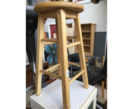 A light wood stool. 