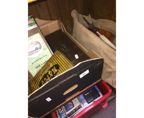 A box of Automobile books, and a bag of plug spanners, battery tester, etc 