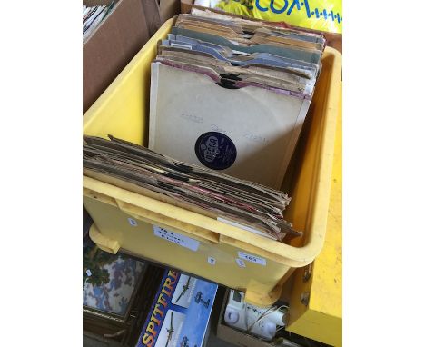 A box containing Elvis 78s and others 