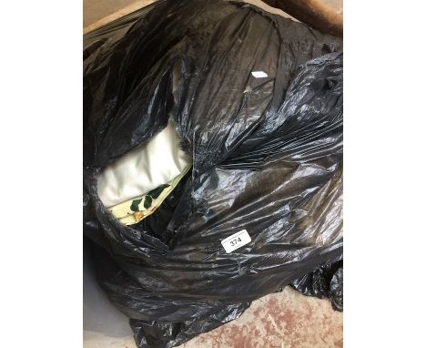 A bundle of misc curtains and bedspread 