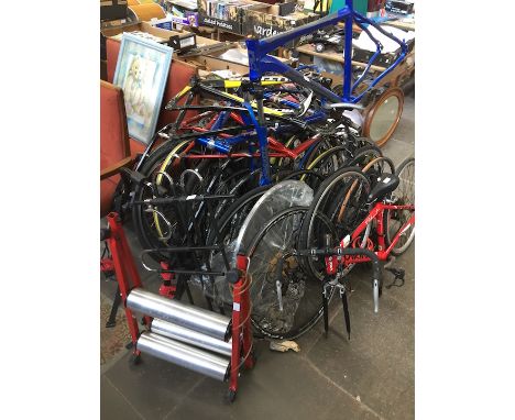 Quantity of bike wheels, tyres, frames, training roller, bike rack etc. 