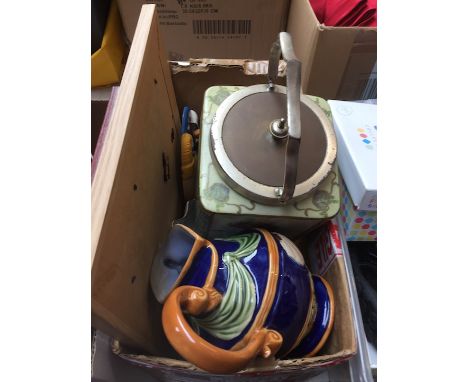 A box of assorted pottery including tea caddy, jugs etc 