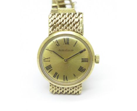 A lady's 9ct gold Jaeger-LeCoultre integral bracelet wristwatch, total weight 26.2g