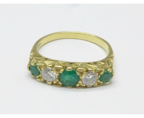 An 18ct gold, emerald and diamond ring, 4.2g, O