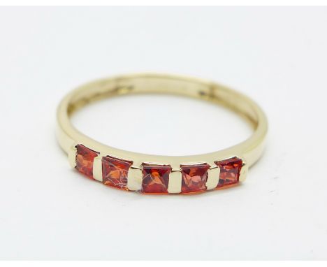 A 9ct gold red stone ring, 1.3g, O