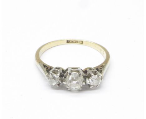 An 18ct gold, platinum set three stone diamond ring, 2.7g, N