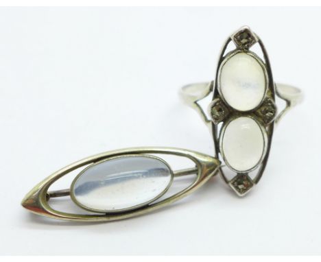 A white metal set Art Deco moonstone and marcasite ring, S, and a moonstone brooch
