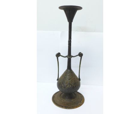 A 19th Century Gothic Revival candlestick