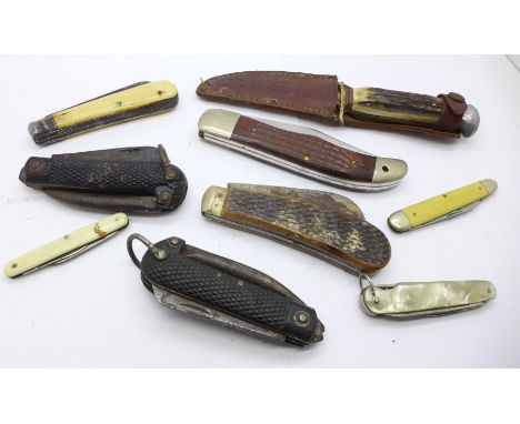 A collection of knives including Army