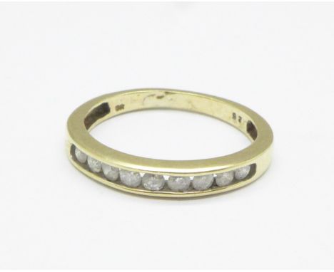 A yellow metal and diamond half eternity ring, 0.25ct diamond weight, 1.4g, J