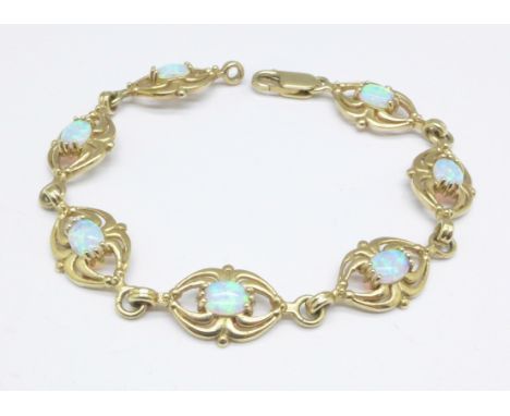 A 9ct gold and opal bracelet, 13.4g