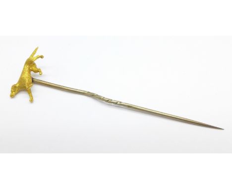 A yellow metal stick pin, Pointer dog