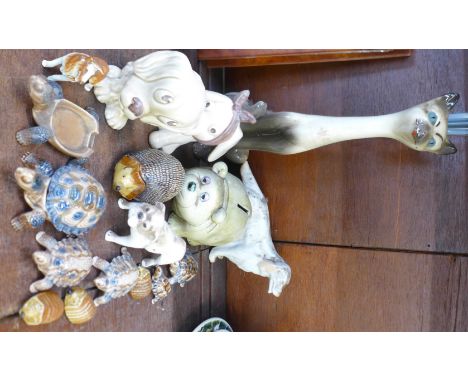 Wade hedgehogs and tortoise, a Sylvac dog with bandaged head, one other Sylvac dog, a Midwinter bulldog, a Belleek Irish Sett