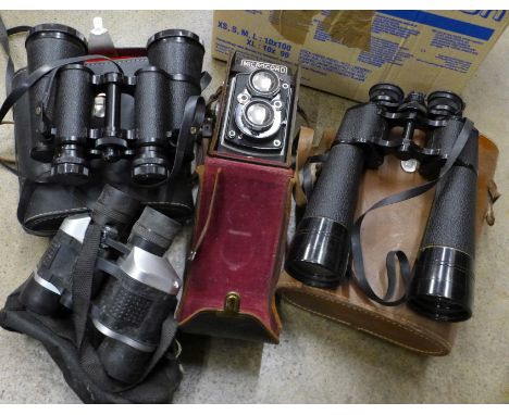 Three pairs of binoculars and a Microcord TLR camera