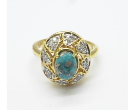 A Persian silver gilt, turquoise and zircon ring, Q