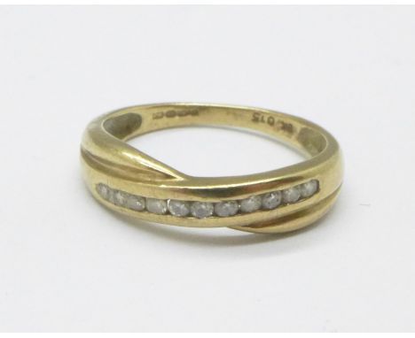 A 9ct gold and diamond ring, 1.6g, K