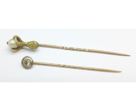 A 9ct gold and diamond stick pin, cased, and a 9ct gold, pearl and claw stick pin, 3.4g