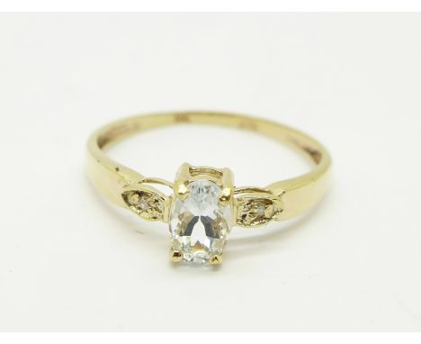 A 9ct gold, aquamarine and diamond ring, 1.0g, O