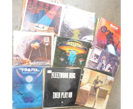 Thirty-five LP records, mainly 1970's, including Status Quo, The Who, U2, Nazareth, etc.