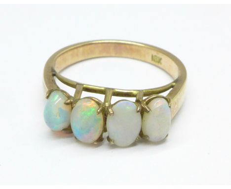 An 18ct gold, four stone opal ring, 3g, L