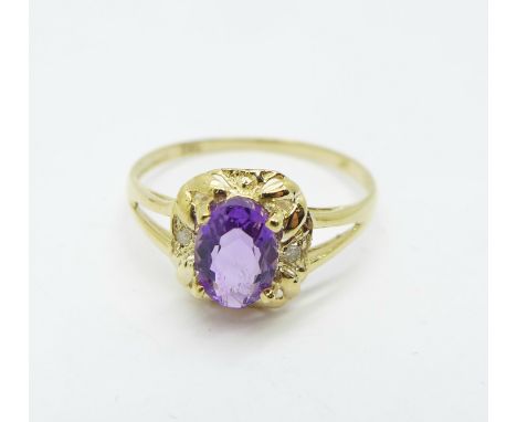 A 9ct gold, amethyst and diamond ring, 1.0g, O