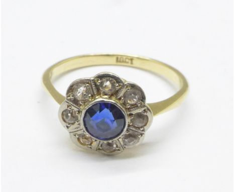 An 18ct gold, sapphire and white sapphire ring, 2.7g, O