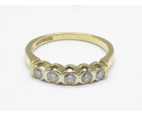 A 9ct gold and five stone diamond ring, 0.25ct diamond weight, 2.1g, L