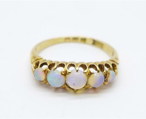 An 18ct gold and opal ring, 3.4g, O