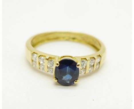 An 18ct gold sapphire and diamond ring, 2.6g, N