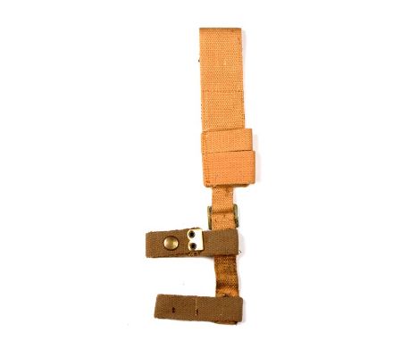 An unissued 08 Pattern bayonet frog with helve strap and carrier. Marked to the reverse of the frog with the War Department a
