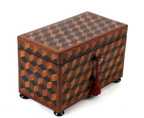 A 19th century Tunbridgeware tumbling block two-division tea caddy, 21cms (8.25ins) wide.Condition Reportstripped and re poli