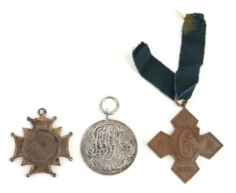 Two late 19th century Army Temperance Association medals together with an early 20th century medal engraved: Presented to Mr.