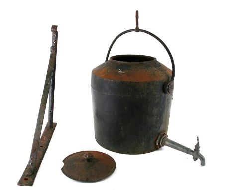A 19th century 8 gallon Kendrick cast iron Hearth Kettle with brass spigot together with its wrought iron hanging bracket. Ma