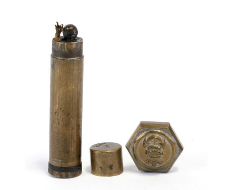 A WW1 trench art petrol lighter made from a .303 Enfield brass oil bottle together with a Royal Navy trench art lighter a/f