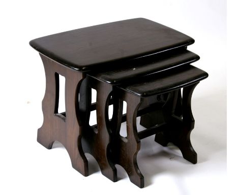 An Ercol nest of tables, the largest 55cm (21ins) wide.