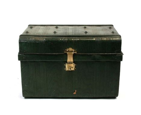 A painted tin trunk with brass lock, 66cm (26ins) wide 